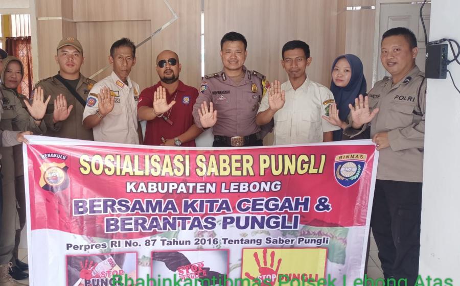 Bhabinkamtibmas Sosialisasi Saber Pungli di Desa Pelabai dan Desa Kota Baru Santan