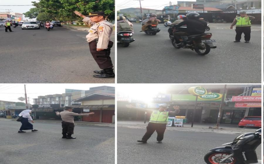 Polsek Gading Cempaka Pengaturan Arus Lalin Pagi Hari di Persimpangan 